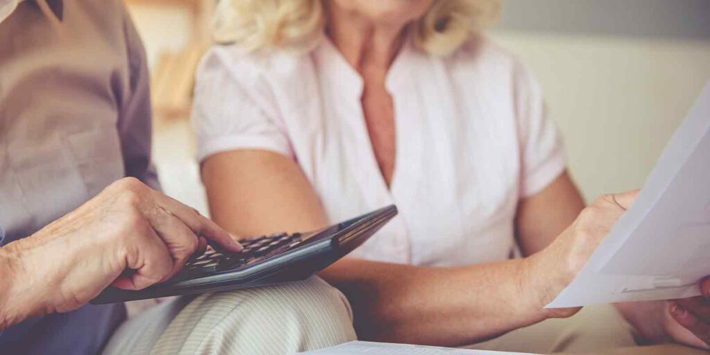 older couple calculating their 401k