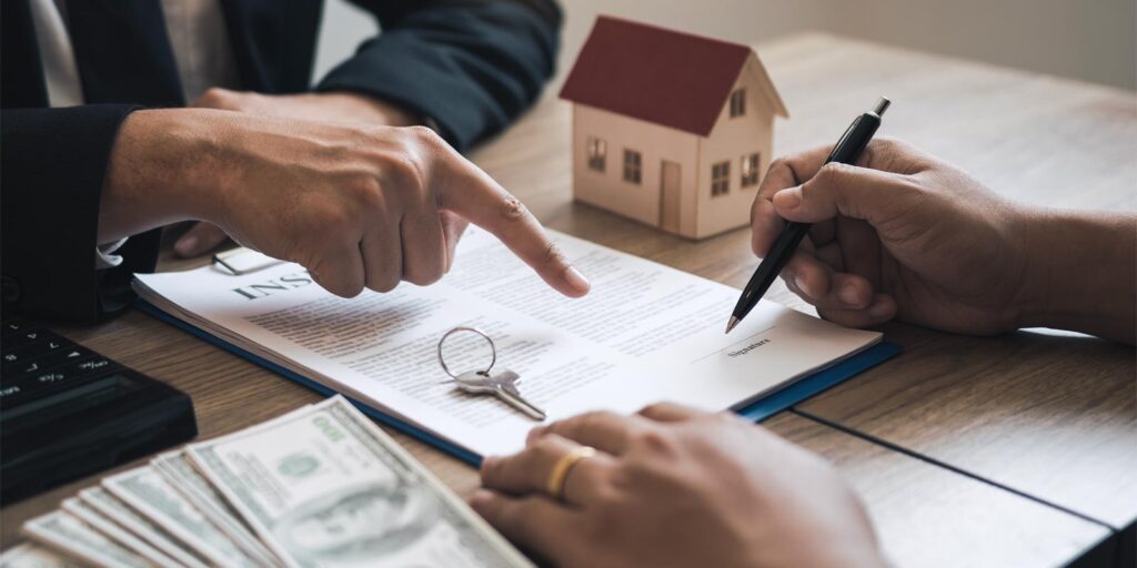 a life insurance consultant helping a client pay off their mortgage with life insurance