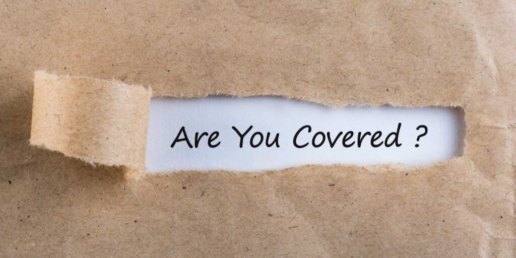 Opened khakhi scratch card showing words are you coverd