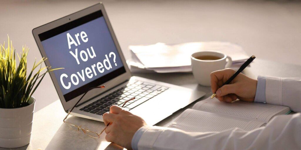 doctor and laptop with text are you covered