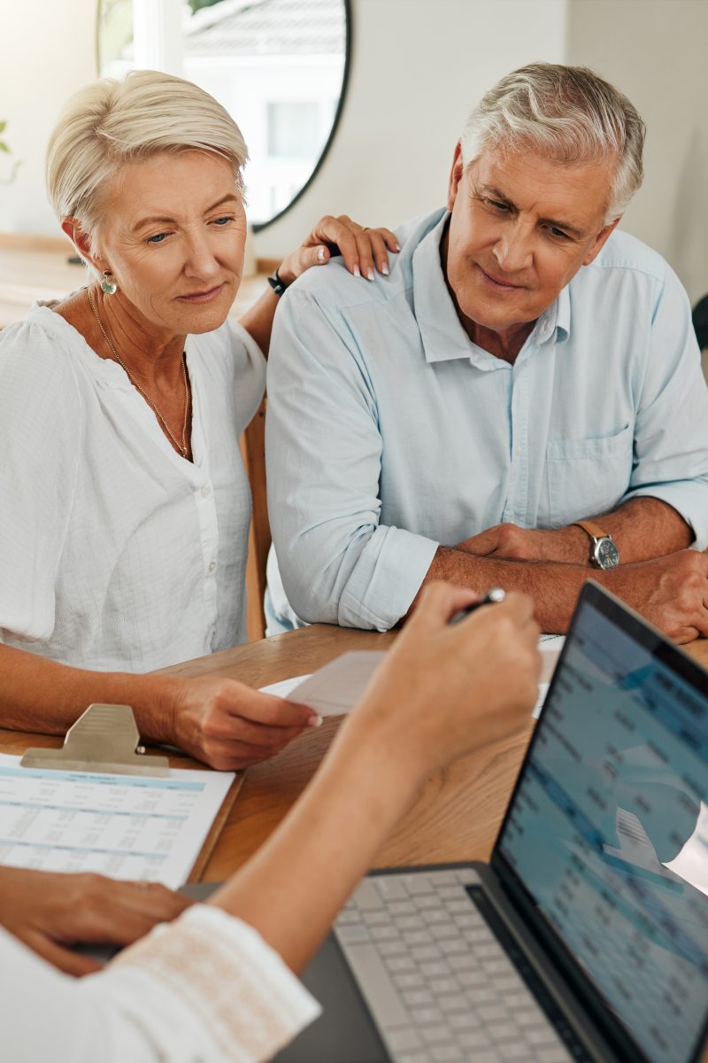 retirees meeting with financial advisor