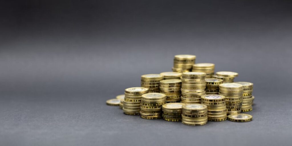 Stacks of Gold Coins with Dark Background