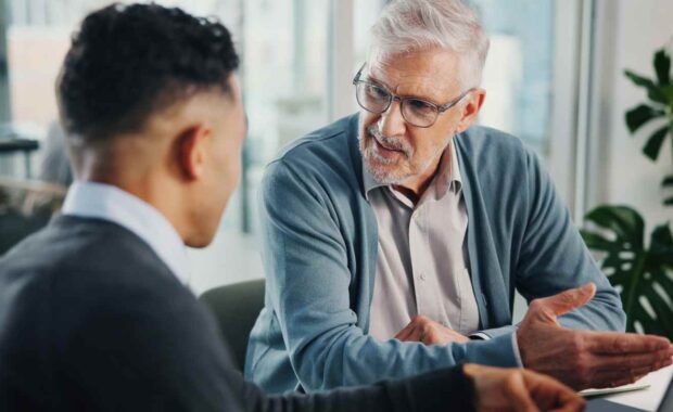 Senior Person Discussing MYGA Term for Retirement Timeline with Finacial Advisor