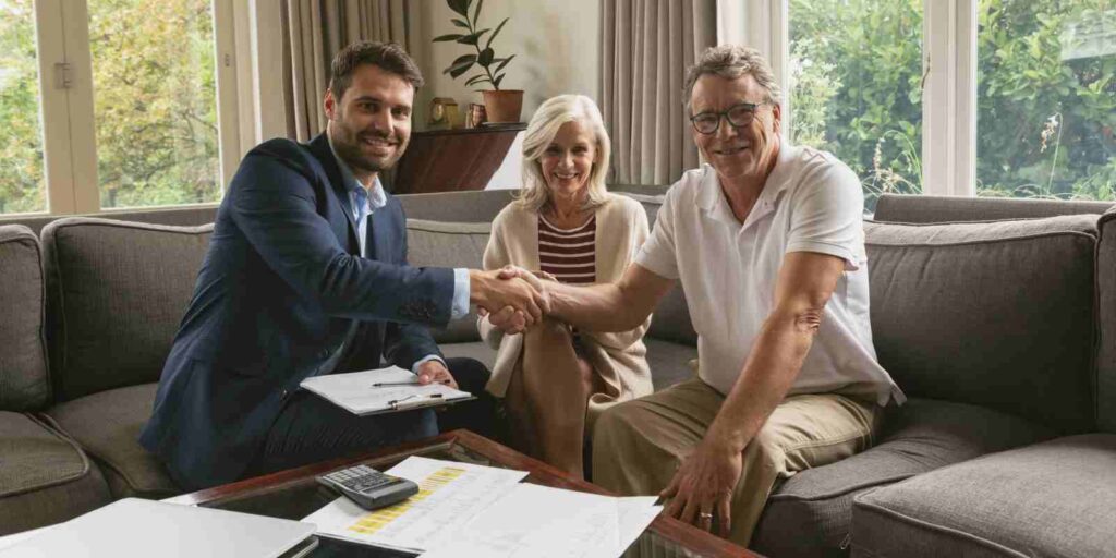 Senior Man Shaking Hand with Financial Advisor for Fixed Annuity Investment