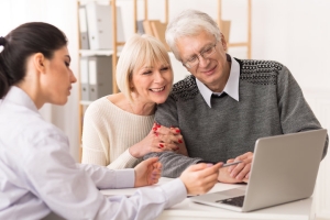 Financial Advisor Showing Return Difference Between MYGA and Fixed Deposit Investment