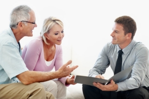 Financial Advisor Explaining MYGA Benefits to Senior Couple