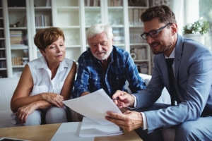 Senior Couple Reviewing MYGA Strategy with Financial Advisor