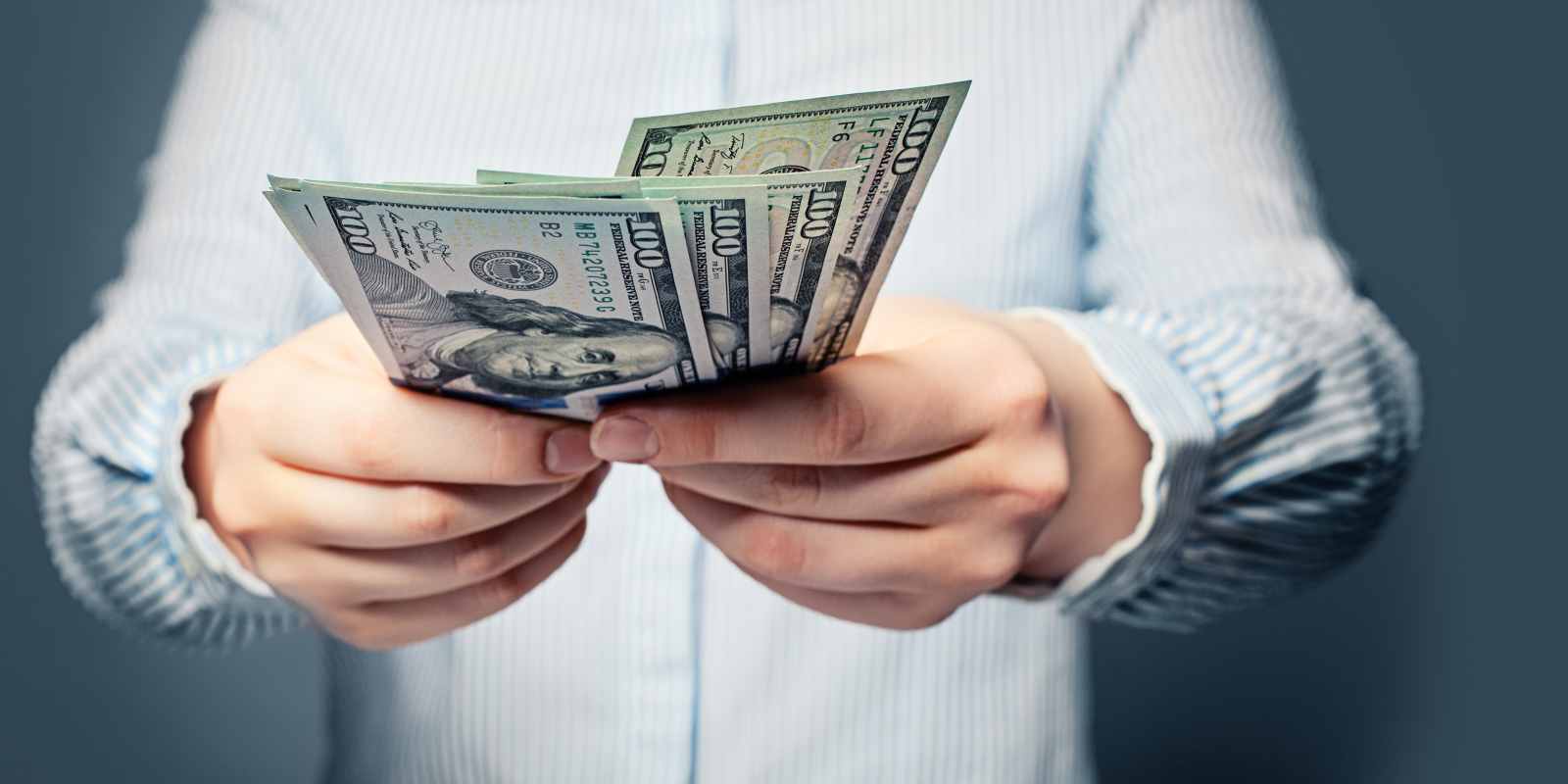 Person Holding Money Withdrawn from an Annuity Before Age 59 and a Half
